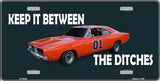 Dukes of Hazzard Keep It Between The Ditches Novelty Metal License Plate